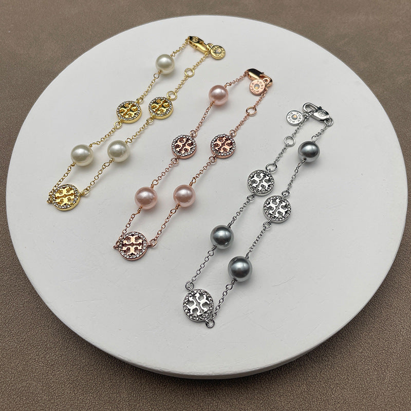 Worn in an everyday yet polished setting—like with a silk blouse or cashmere sweater—to emphasize its "elevated basics" appeal.