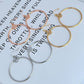 Rose gold Tory Burch Double T logo hoop earrings, featuring a stylish and elegant design for women.