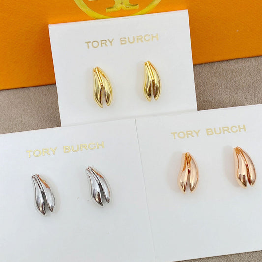 High-definition shot of the pair of earrings laid flat on pure white background, arranged symmetrically.