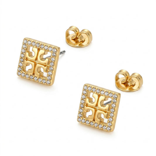 Gold square earrings with intricate designs on a white background
