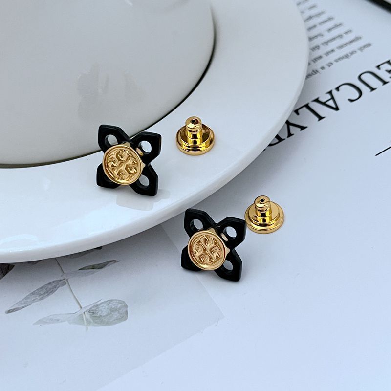  For a key item like earrings, a close-up showing the backing or closure mechanism.