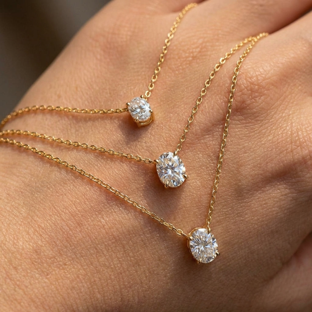 Macro, necklace draped across female hand, natural curve, warm soft light, mirror metal shine, sharp sparkle, blurred skin background, detailed texture, intimate luxury feel.