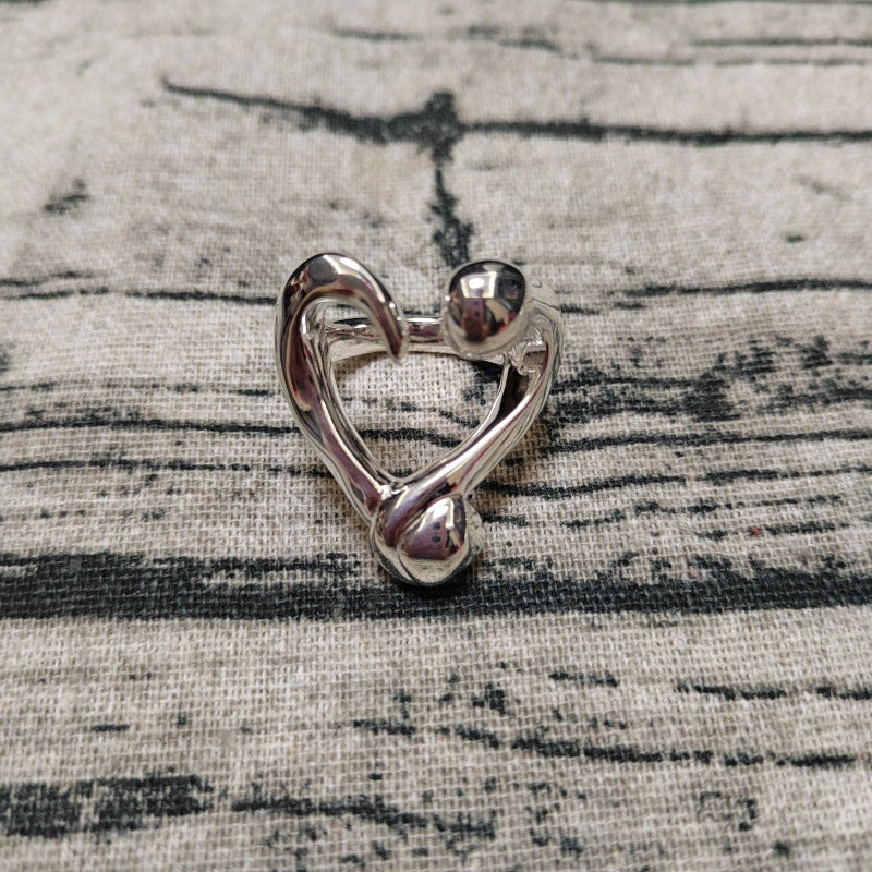 UNOde50 Open ring with a nailed heart