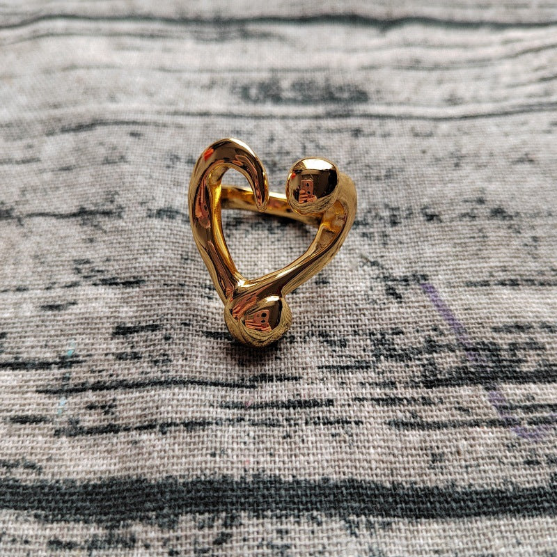 UNOde50 Open ring with a nailed heart