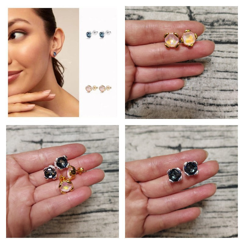 Blue crystal studs on neutral or ocean-inspired background. Alt: “UNOde50 Stud Earrings with Blue Crystal – Silver Sapphire Studs.”