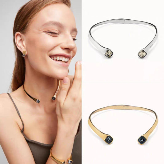  Necklace on neutral background. Alt: “UNOde50 White Crystal Necklace – Silver Crystal Pendant.”