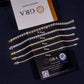 Set of diamond bracelets with size labels on a dark background, featuring the GRA brand.
