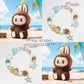 Collage of a plush toy and two bracelets with a beach background