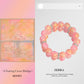 Pink beaded bracelet with ZERRA branding on a light pink background