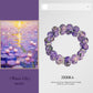 Purple beaded bracelet with 'Zerra' branding next to a painting of water lilies by Monet.