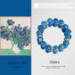Blue beaded bracelet with 'Zerra' branding next to Van Gogh's 'Irises' painting.