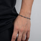 “Male model wearing vintage sterling silver bracelet”