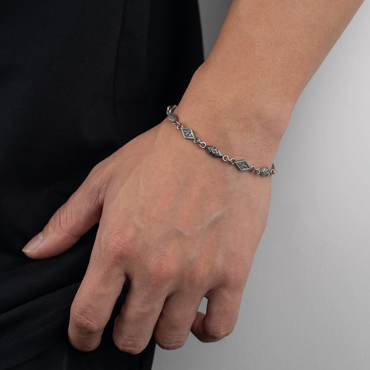 “Unisex styling of oxidized silver bracelet”