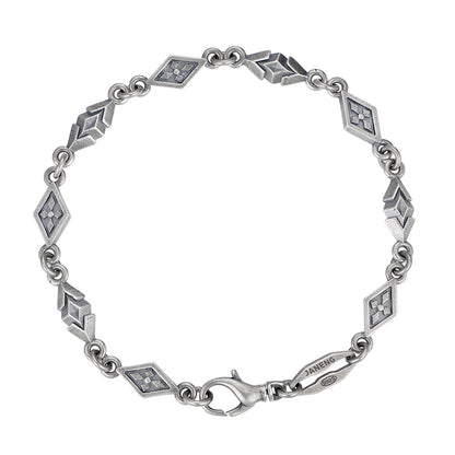 “Vintage oxidized 925 sterling silver diamond-pattern bracelet flat lay”