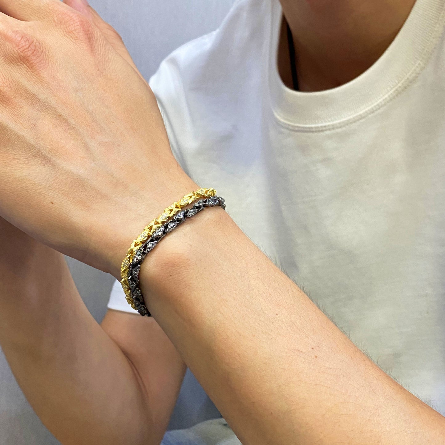 “Men wearing vintage sterling silver snake bone bracelet”