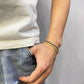 “Men wearing vintage sterling silver snake bone bracelet”