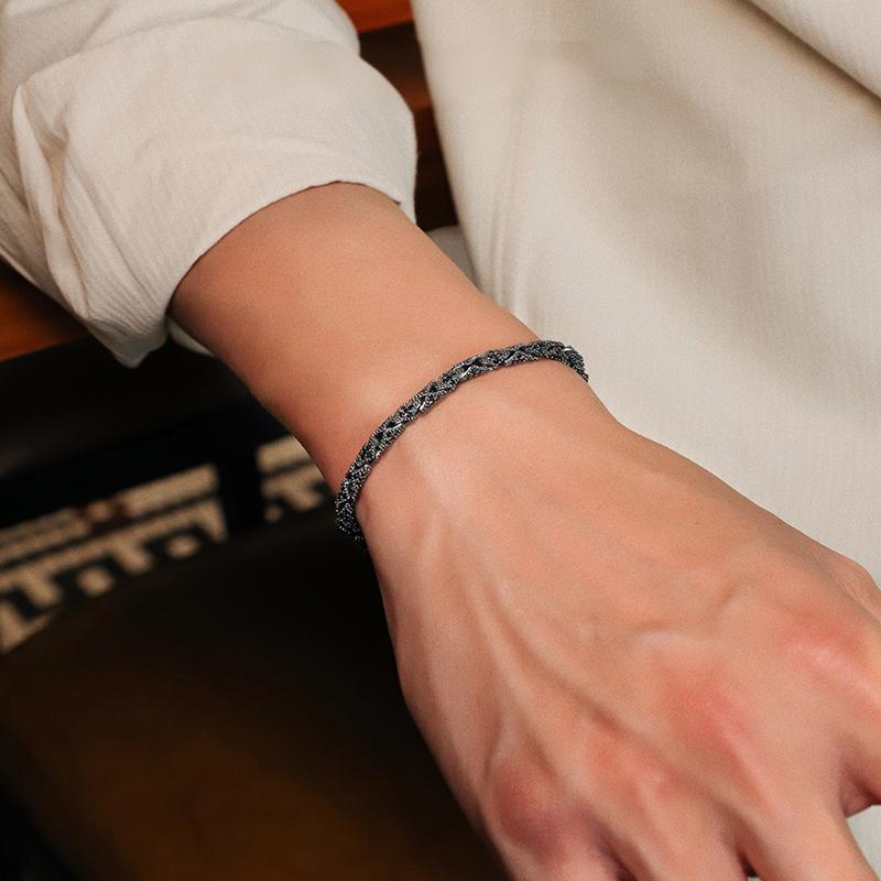 “Men wearing vintage sterling silver snake bone bracelet”