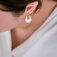 Model Wearing Geometric Silver Drop Earrings – Elegant Minimalist Style