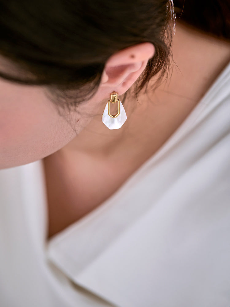 Model Wearing Geometric Silver Drop Earrings – Elegant Minimalist Style
