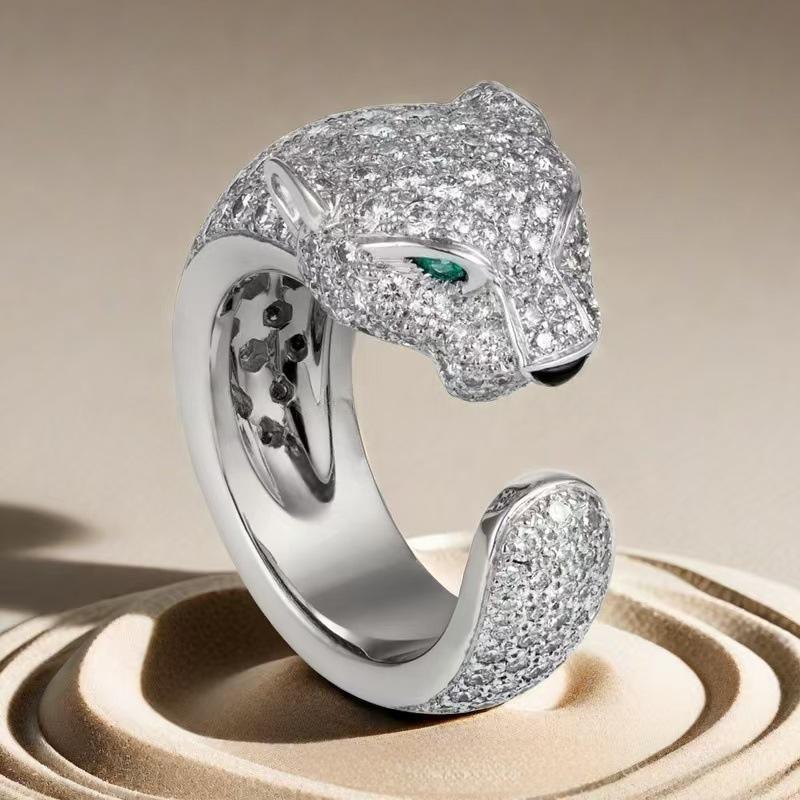 “Wild Grace” Leopard Head Ring | 18K Gold-Plated Sterling Silver Full Zircon Animal RingSilver panther-shaped ring with gemstones on a beige background