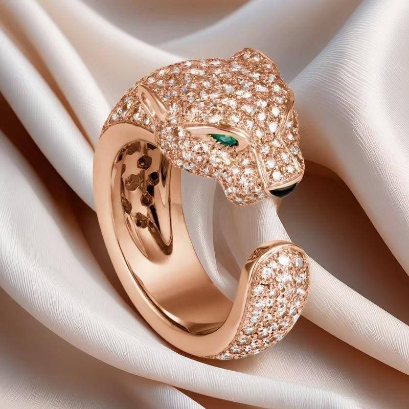 “Wild Grace” Leopard Head Ring | 18K Gold-Plated Sterling Silver Full Zircon Animal RingRose gold panther-shaped ring with diamond accents on a white fabric background
