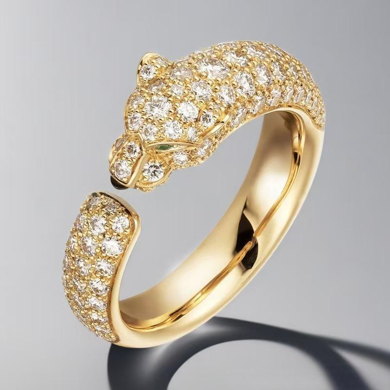 “Wild Grace” Leopard Head Ring | 18K Gold-Plated Sterling Silver Full Zircon Animal Ring womenGold ring with diamond-encrusted panther design on a gray background