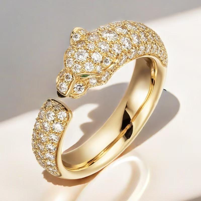 “Wild Grace” Leopard Head Ring | 18K Gold-Plated Sterling Silver Full Zircon Animal Ring womenGold ring with diamond-encrusted panther design on a light background