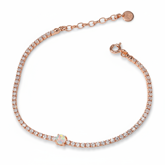 Rose gold bracelet with opal stone and diamonds on a white background