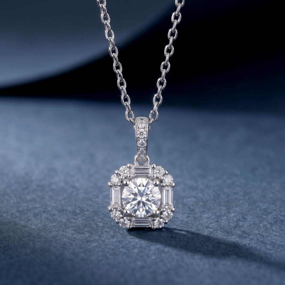 Hanging perspective shot of Art Deco baguette halo diamond pendant necklace.