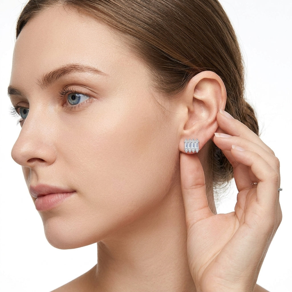 Model wearing Art Deco baguette and round moissanite stud earrings for modern vintage style.