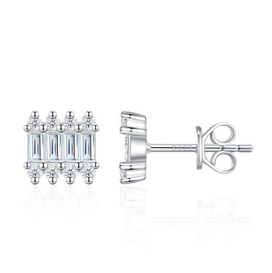 Art Deco baguette and round moissanite stud earrings in sterling silver.
