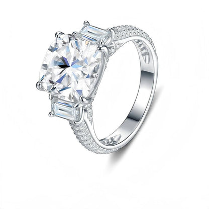 Three-quarter studio perspective of an art deco tapered baguette moissanite anniversary statement ring with a micro pave band.