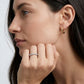 Model wearing brilliant full eternity lab grown diamond wedding band on hand