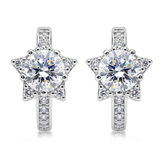 Celestial star halo diamond huggie hoop earrings in sterling silver.