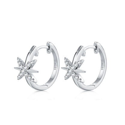 Side profile showing hinged clicker closure on celestial north star moissanite hoop earrings.