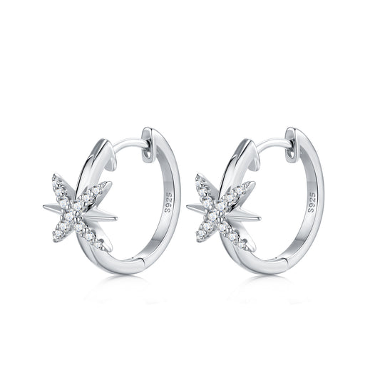 Side profile showing hinged clicker closure on celestial north star moissanite hoop earrings.