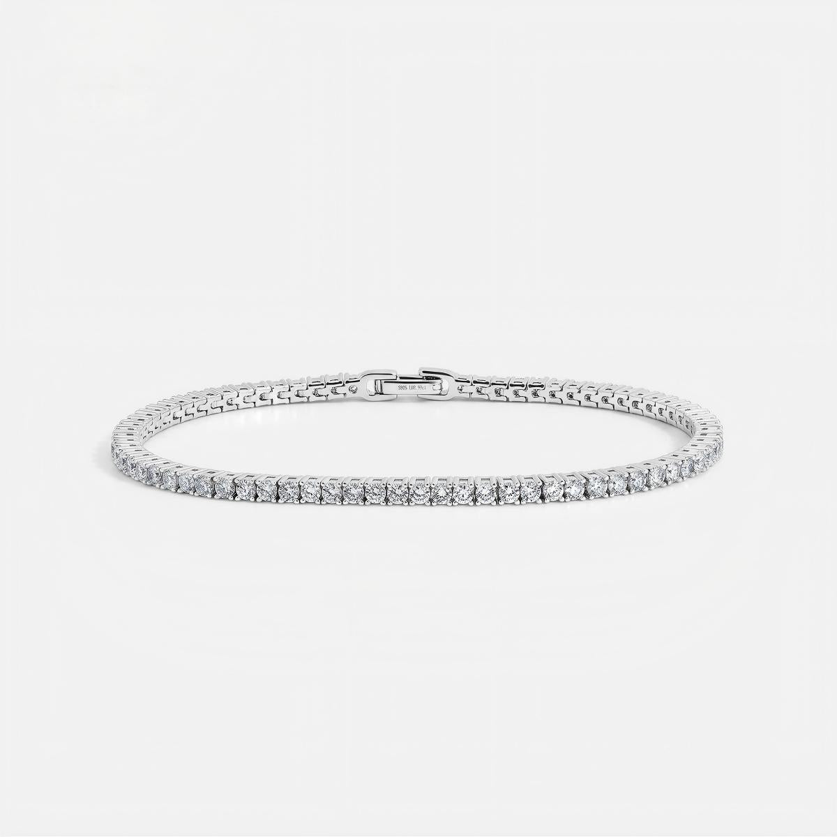 Classic 4-prong round lab-grown diamond eternity tennis bracelet in 925 sterling silver.