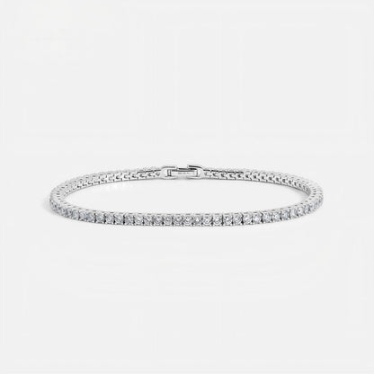Classic 4-prong round lab-grown diamond eternity tennis bracelet in 925 sterling silver.