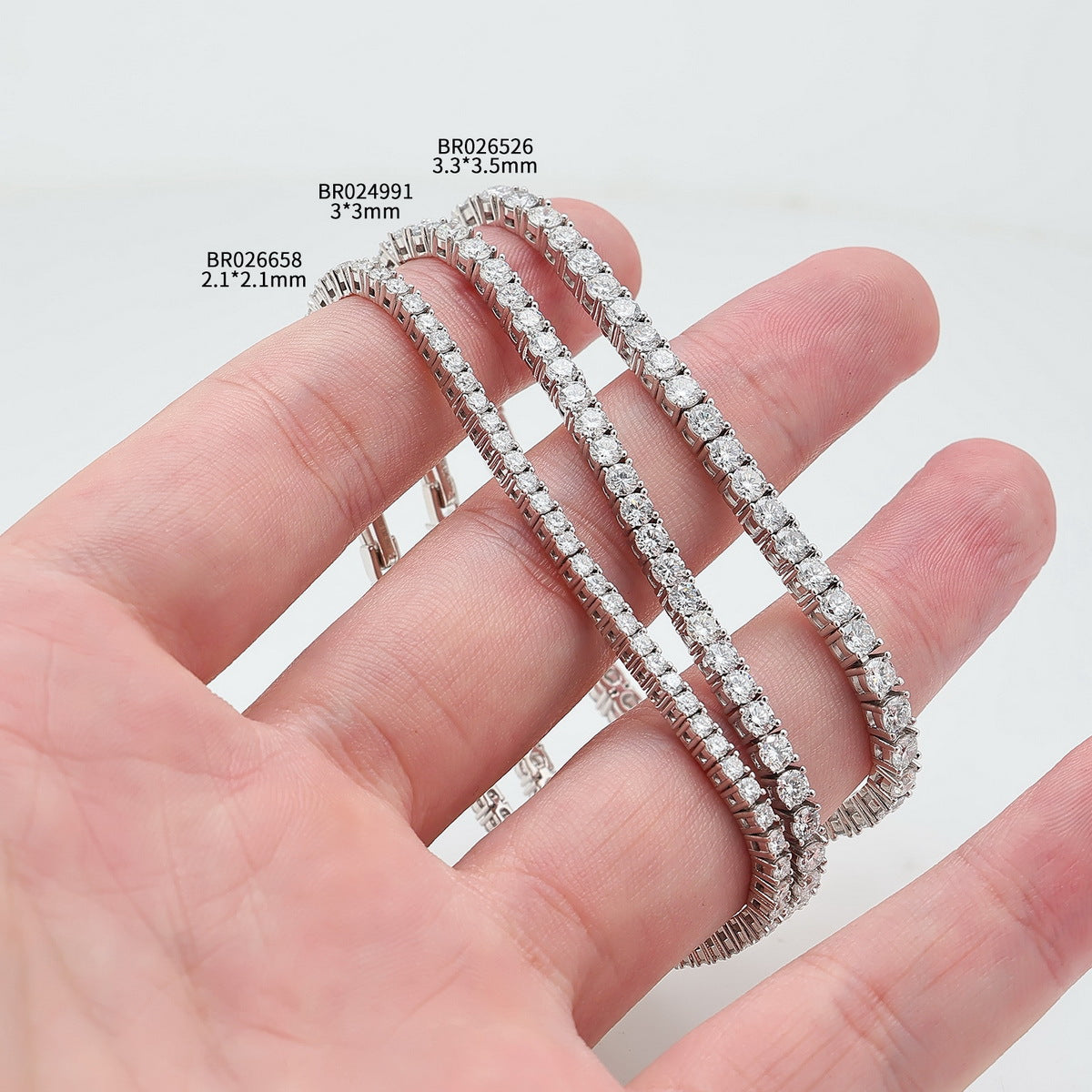Comparison view of classic 4-prong round lab-grown diamond tennis bracelets in multiple stone sizes.
