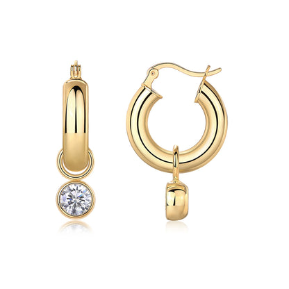 Classic gold tubular hoop earrings with bezel-set solitaire moissanite dangle charms, front and profile view on white background.