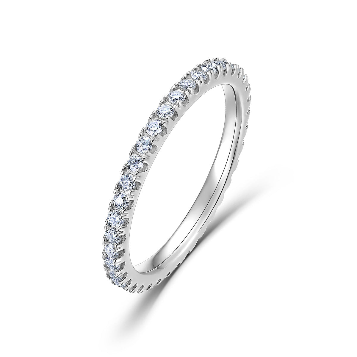 Classic lab grown diamond eternity band ring in sterling silver isolated on white background