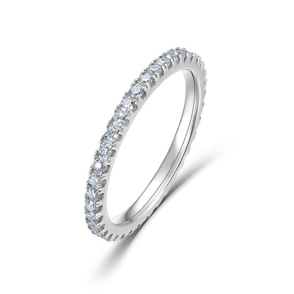 Classic lab grown diamond eternity band ring in sterling silver isolated on white background