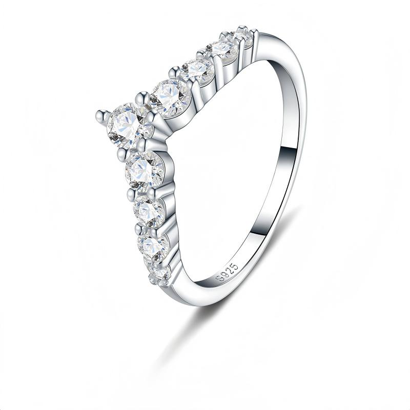 Three-quarter studio perspective of a classic old money graduated wishbone wedding band highlighting the sharp v-contour.