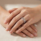 High-end fashion lookbook view of a model's hands gracefully wearing a classic old money pave anchor chain moissanite statement band.