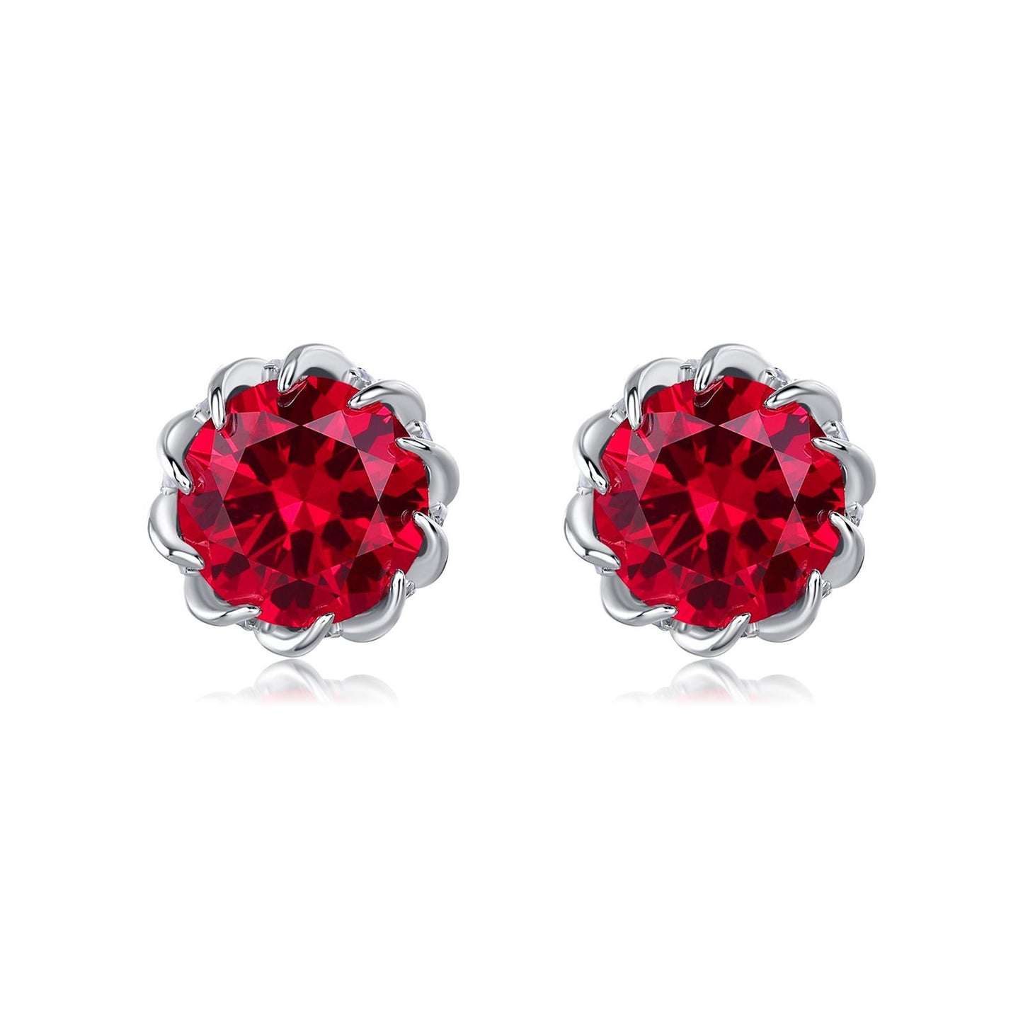 Classic round-cut created ruby stud earrings in 925 sterling silver flower setting, studio shot.