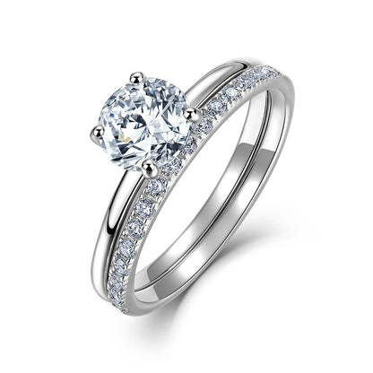 Classic round cut lab grown diamond solitaire engagement ring with pavé wedding band stacking set