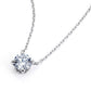 Side view showing four-prong basket setting of round solitaire pendant necklace.