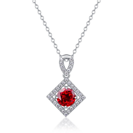 White background front view of a classic lab-grown ruby rhombus halo talisman pendant on a sterling silver chain.