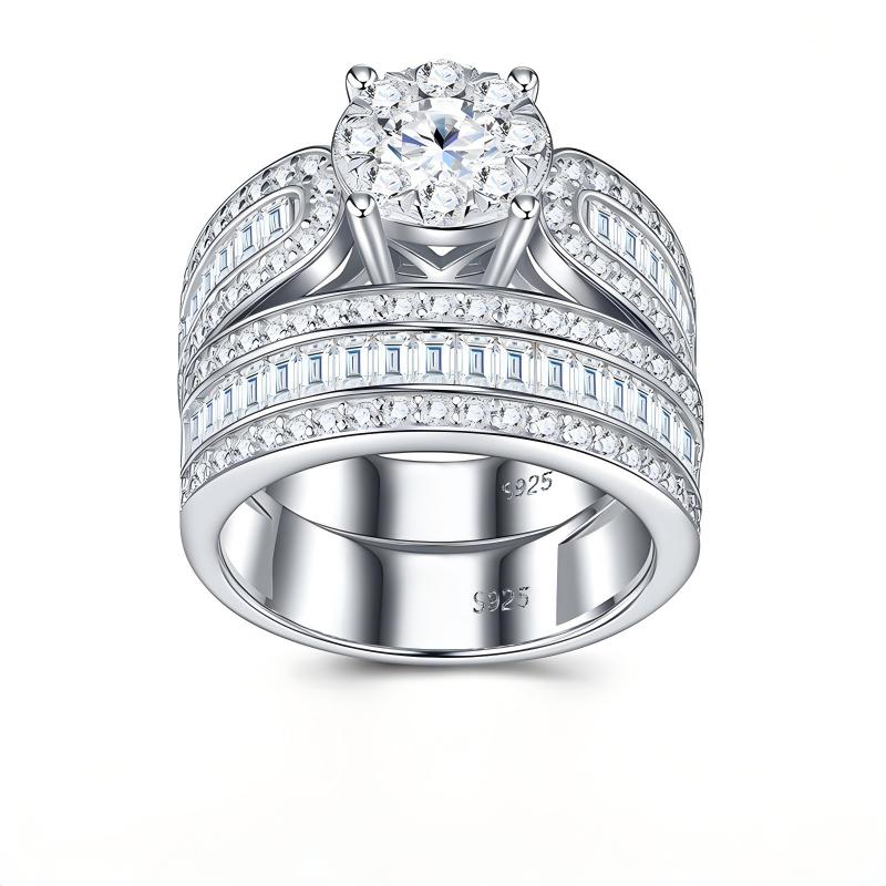 Classic silver round cut moissanite engagement ring with matching wide baguette pave wedding band set.