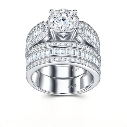Classic silver round cut moissanite engagement ring with matching wide baguette pave wedding band set.
